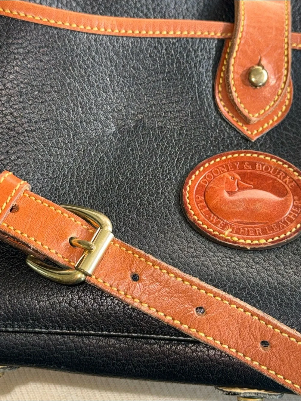 Vintage Dooney & Bourke All-Weather Leather (AWL) Arrowhead Essex Crossbody Bag.